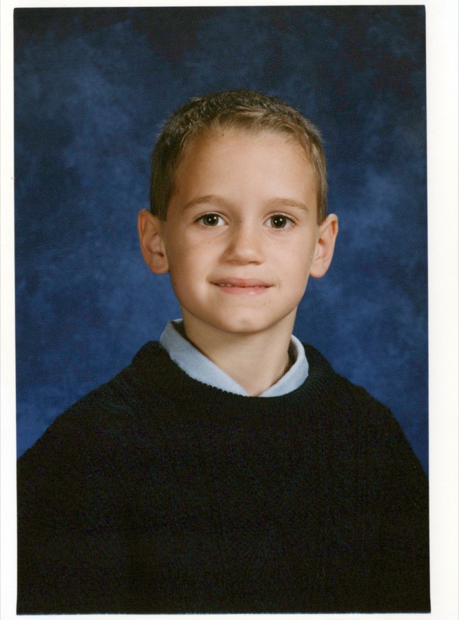 Nick around ten years old, from a scanned family print