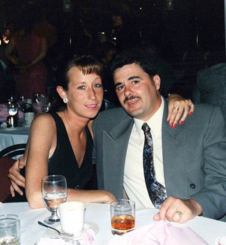 Lou and Rose at a formal dinner table